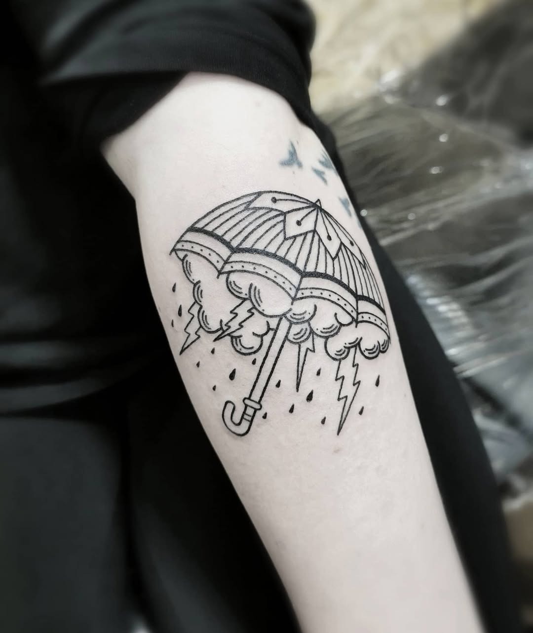 Stylish umbrella tattoo with stormy vibes Tattoo Design