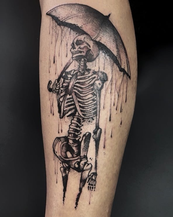 Unique skeleton umbrella tattoo design for art lovers Tattoo Design