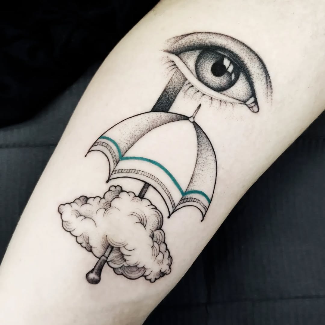 Unique umbrella tattoo blending nature and vision Tattoo Design