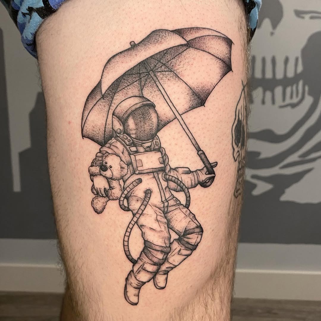Whimsical astronaut sheltered by an umbrella Tattoo Design