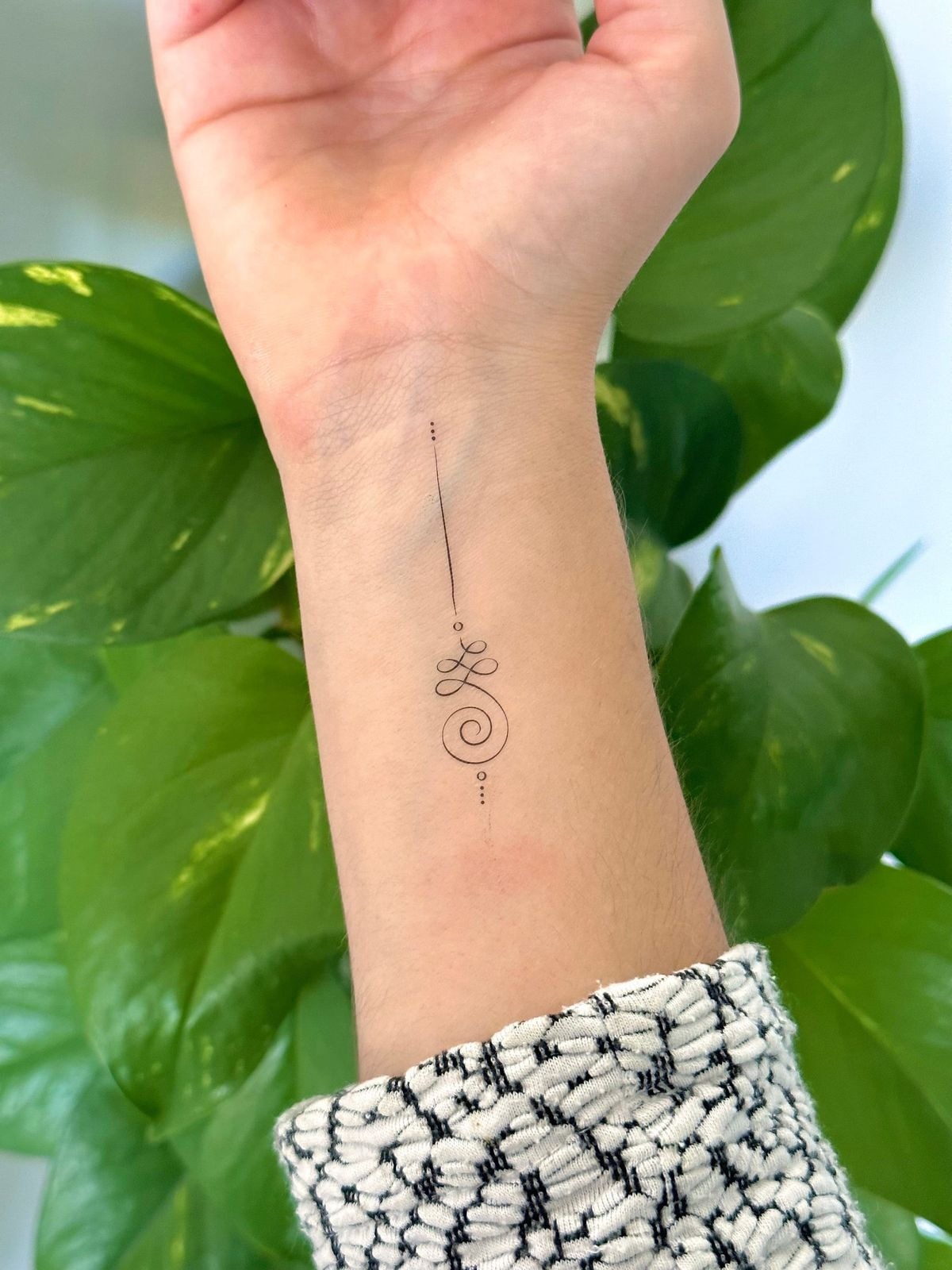 Lotus with Script Unalome Tattoo Design