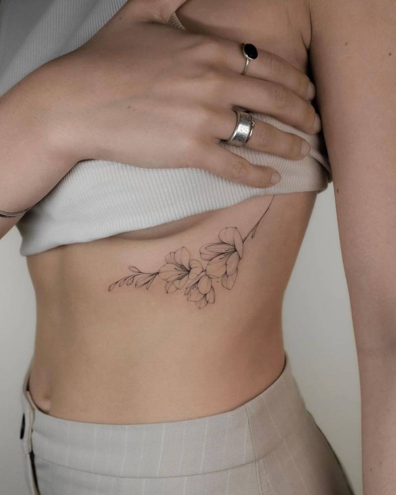 Delicate Botanical Line Art Tattoo Design