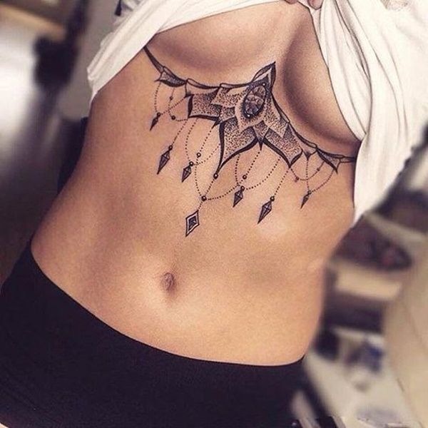 Dynamic and Edgy Mandala-Inspired Wings Tattoo Design