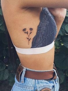 Floral Simplicity: Tiny Botanical Design Tattoo Design