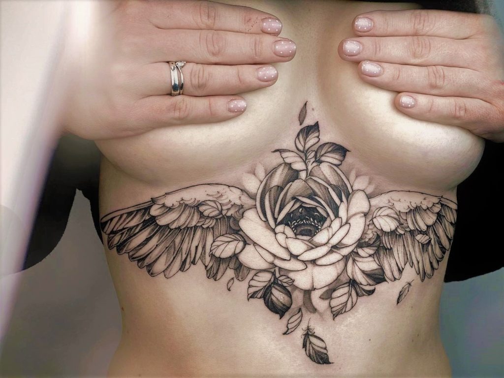 Floral Wings with Subtle Feathers Tattoo Design