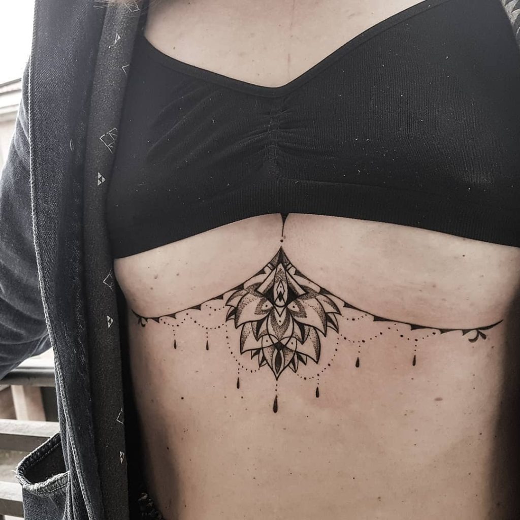 Ornamental Centerpiece with Tribal Inspiration Tattoo Design