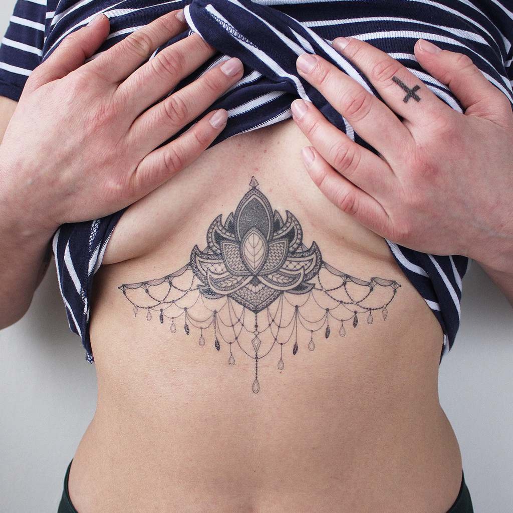 Ornamental Lotus with Hanging Details Tattoo Design