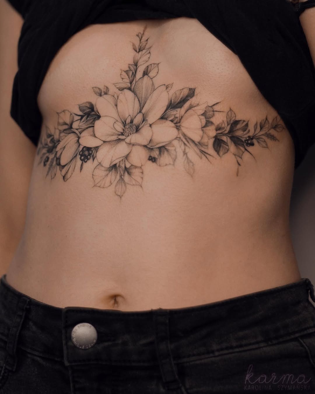 Elegant floral underboob tattoo design Tattoo Design