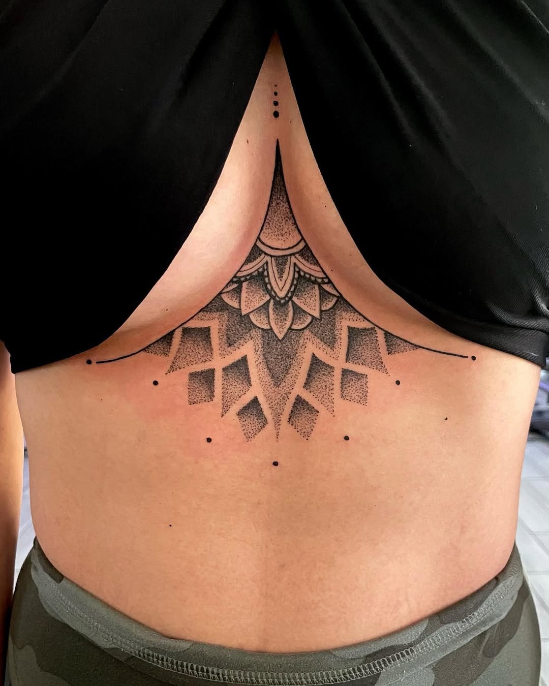 Elegant geometric underboob tattoo design inspiration Tattoo Design
