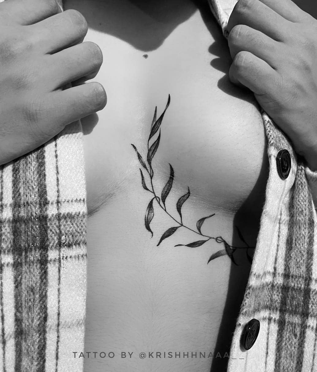 Elegant underboob tattoo with floral motifs Tattoo Design