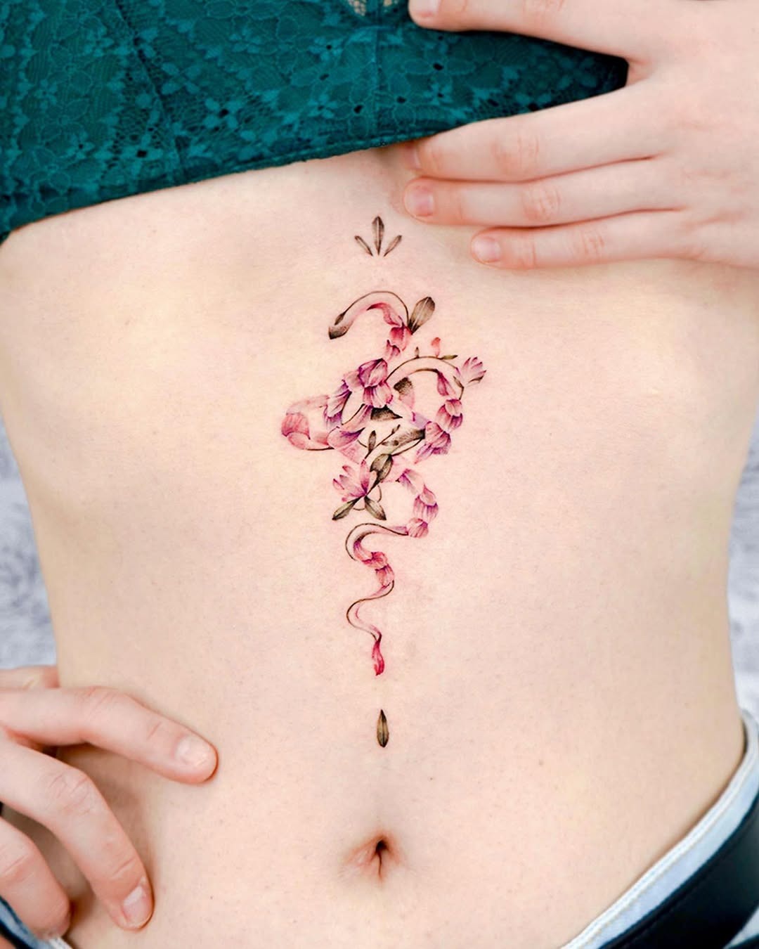 Stunning floral underboob tattoo design Tattoo Design