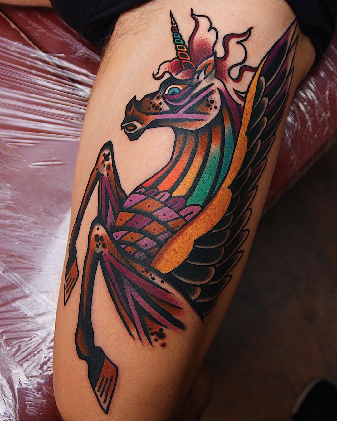 A vibrant unicorn tattoo full of fantasy. Tattoo Design