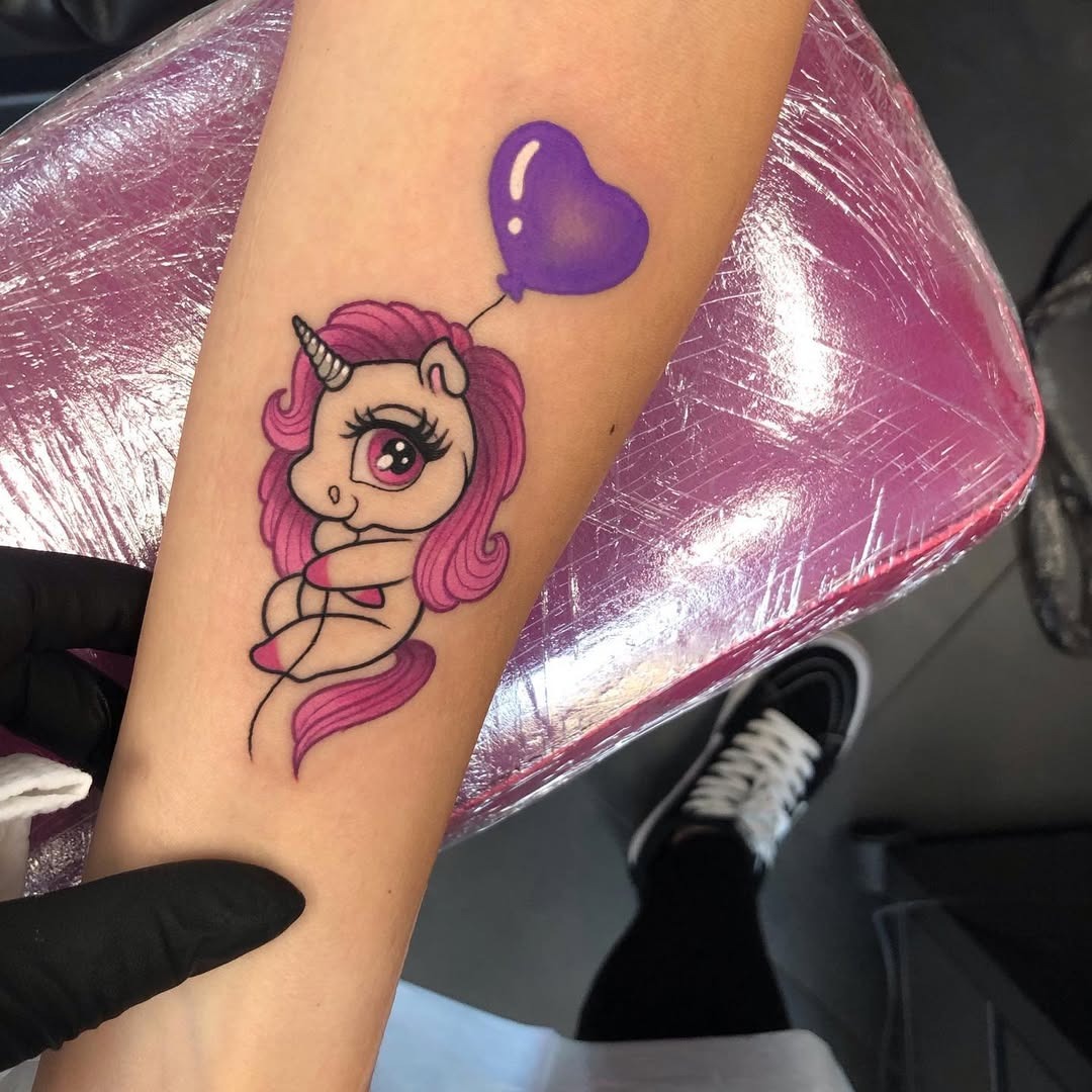 Adorable unicorn with a heart balloon tattoo Tattoo Design