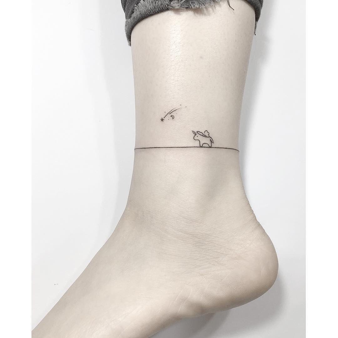 Enchanting unicorn tattoo with whimsical flair Tattoo Design
