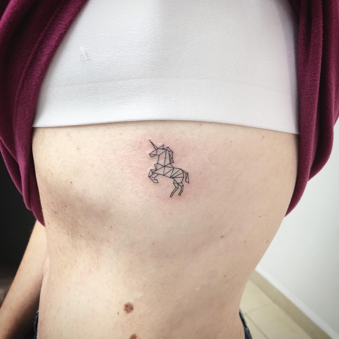 Sleek Unicorn Tattoo with Geometric Lines Tattoo Design