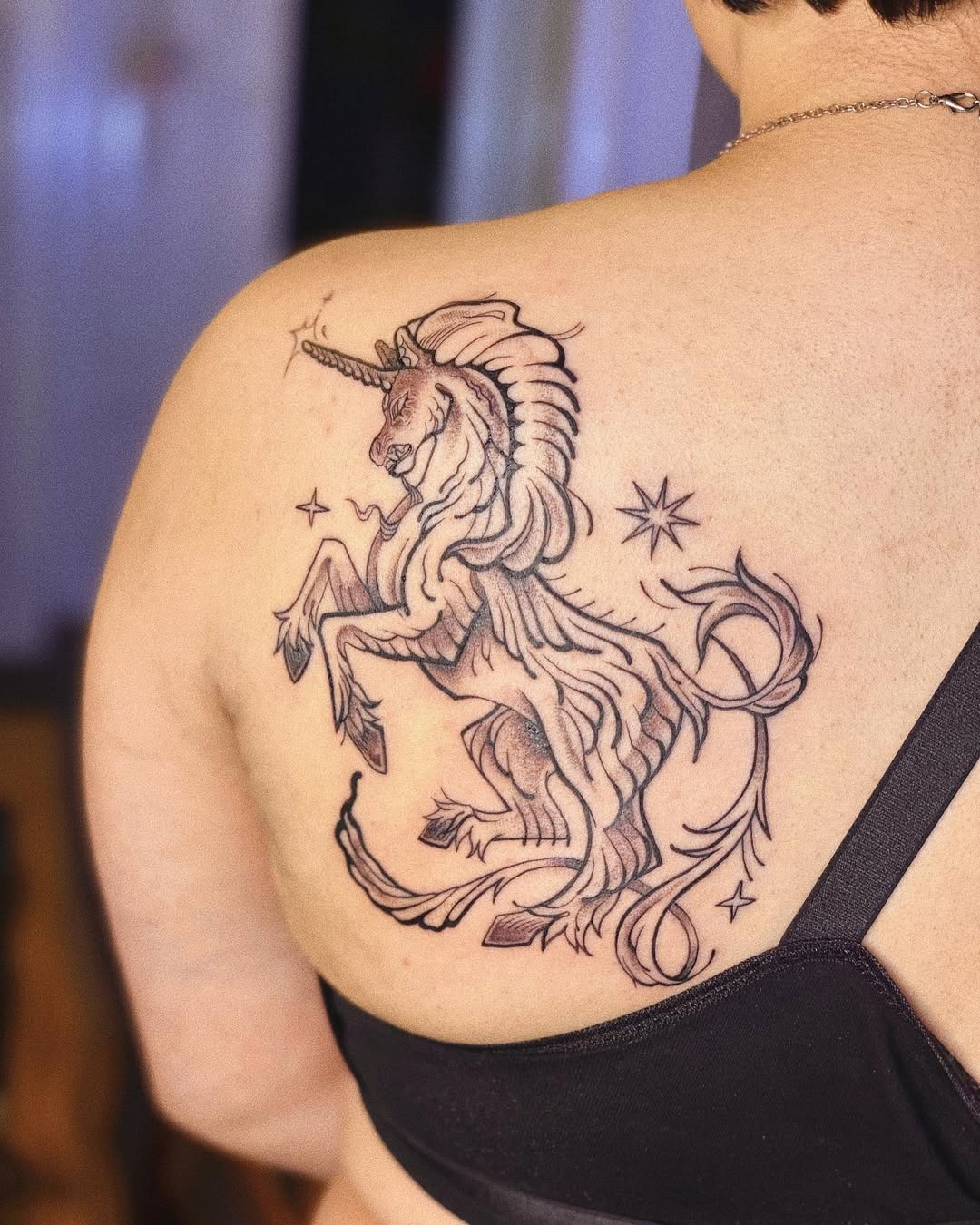Stunning unicorn tattoo with elegant detailing Tattoo Design