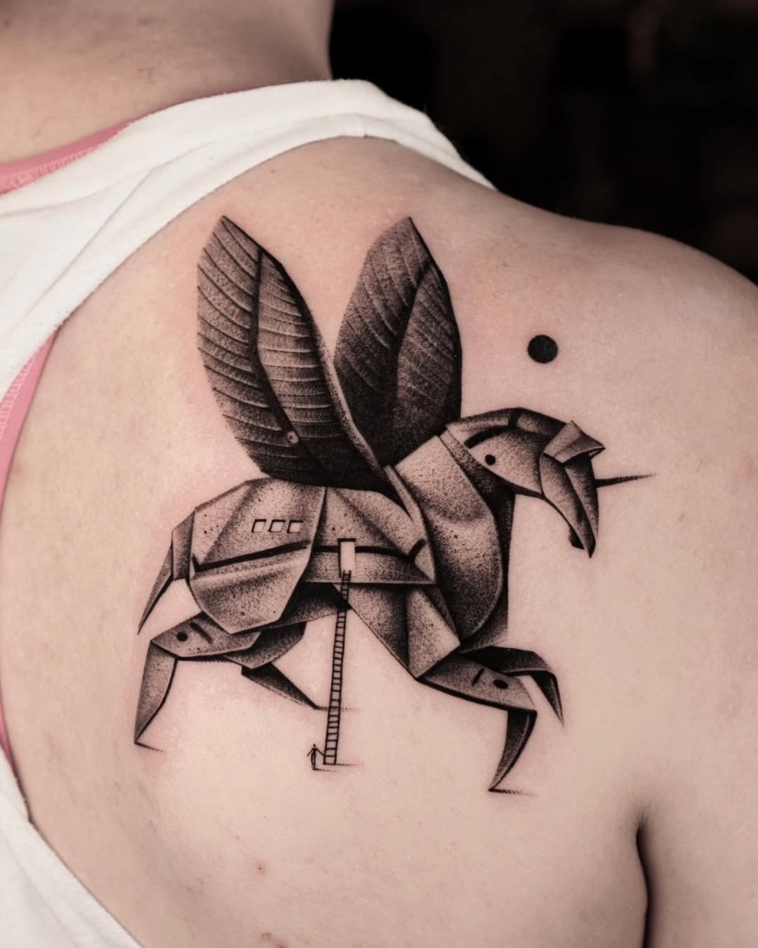 Unique abstract unicorn tattoo design on the back Tattoo Design