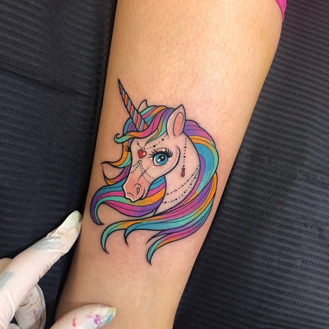 Vibrant Unicorn Ink with Whimsical Charm Tattoo Design