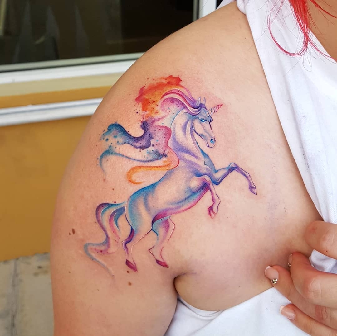Whimsical watercolor unicorn tattoo design Tattoo Design