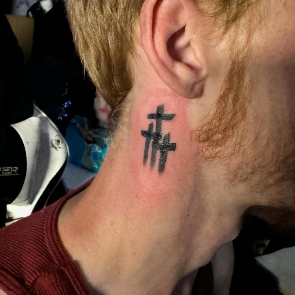 Cross with Roman Numerals and Butterfly Tattoo Tattoo Design