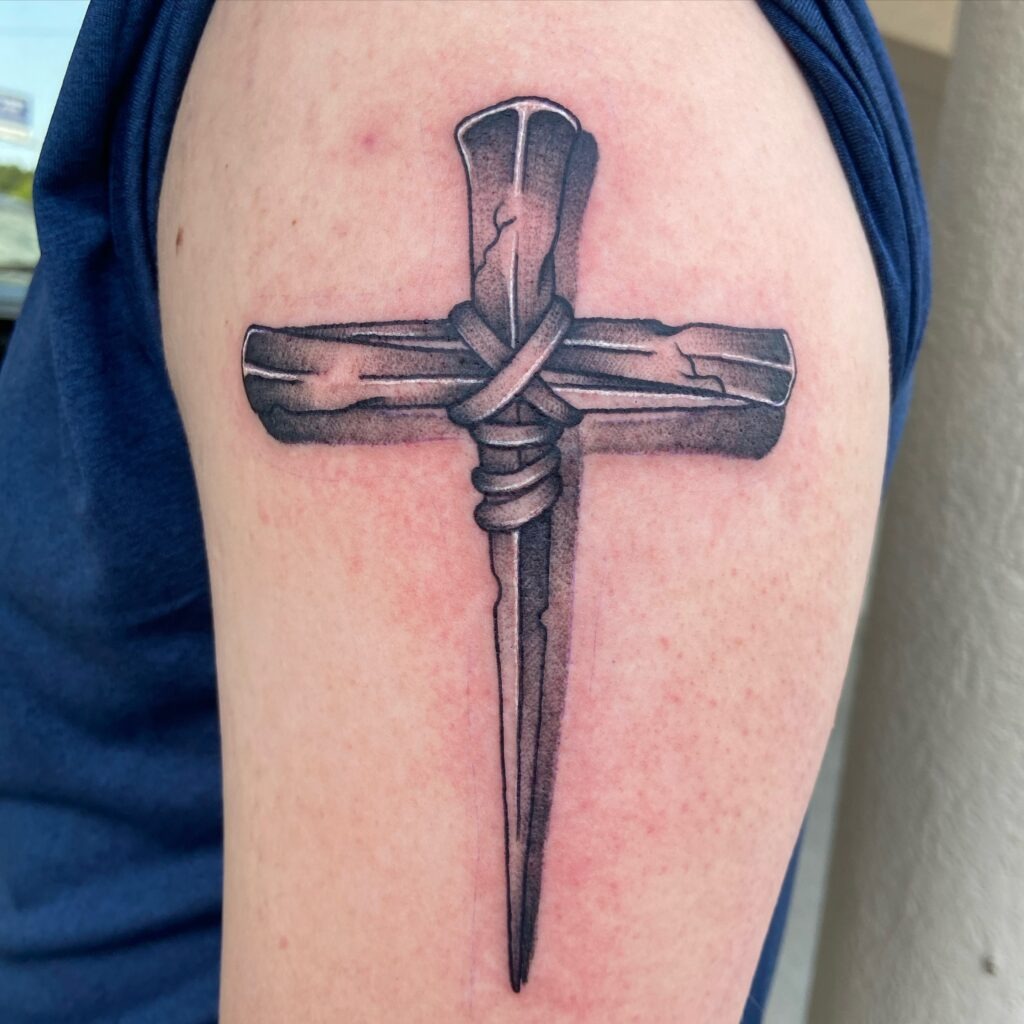 Minimalist Cross with "His" Script Wrist Tattoo Tattoo Design
