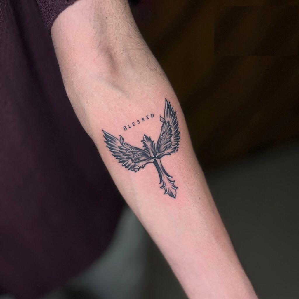 Radiant Cross with Rose and Sunray Forearm Tattoo Tattoo Design