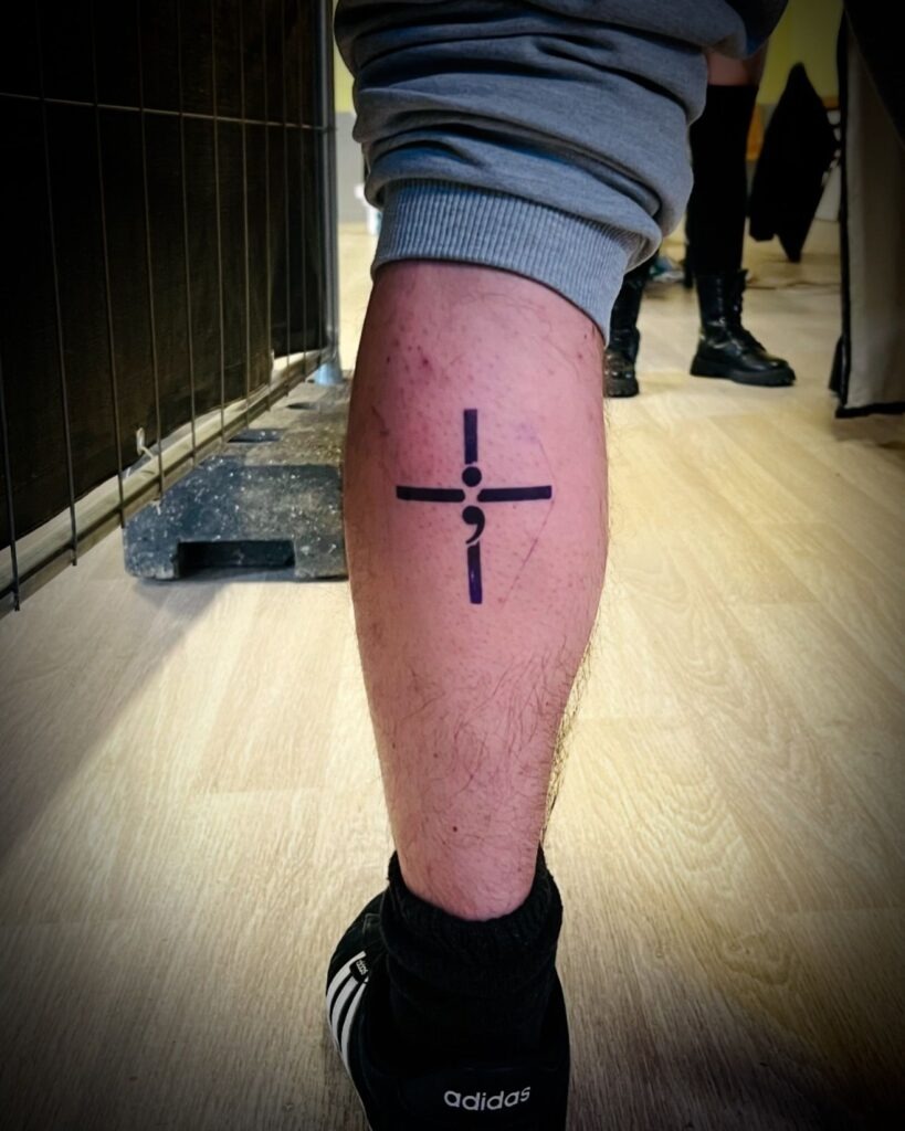 Wooden Cross with Crown of Thorns and Cloth Tattoo Tattoo Design