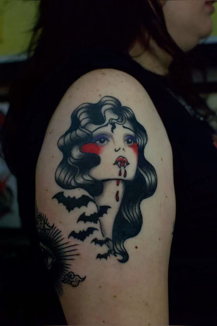 Flirty Red-Eyed Vampire Doll Tattoo Tattoo Design