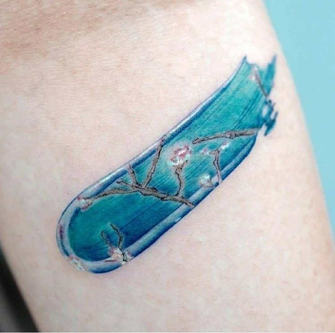 Elegant blue floral tattoo with Van Gogh influence Tattoo Design