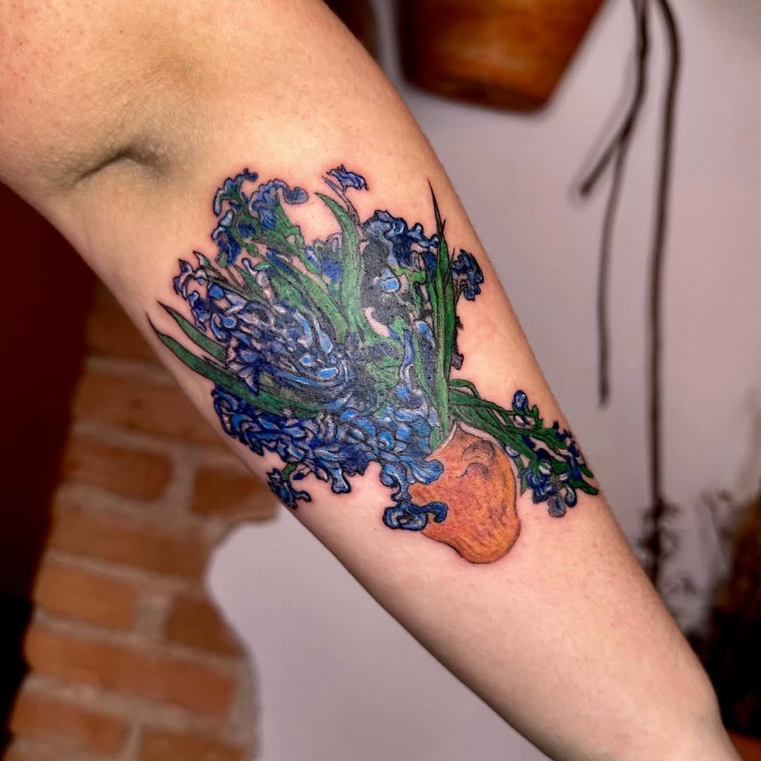 Vibrant Flower Pot Tattoo with Blue Blooms Tattoo Design