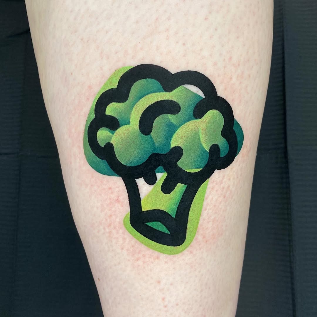 Playful broccoli tattoo with vibrant colors Tattoo Design