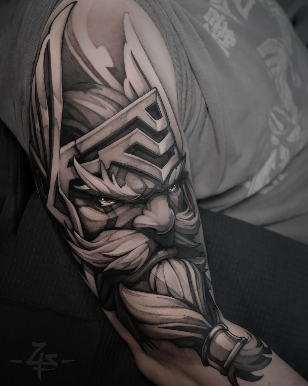 Bold Viking Warrior Face Tattoo in Black Ink Tattoo Design