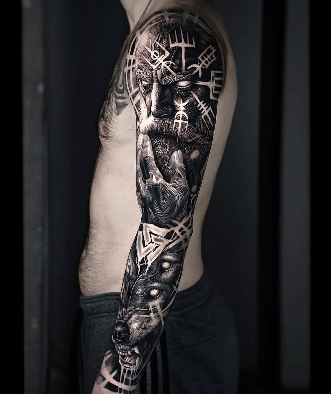 Intricate Viking Tattoo with Wolf Imagery Tattoo Design