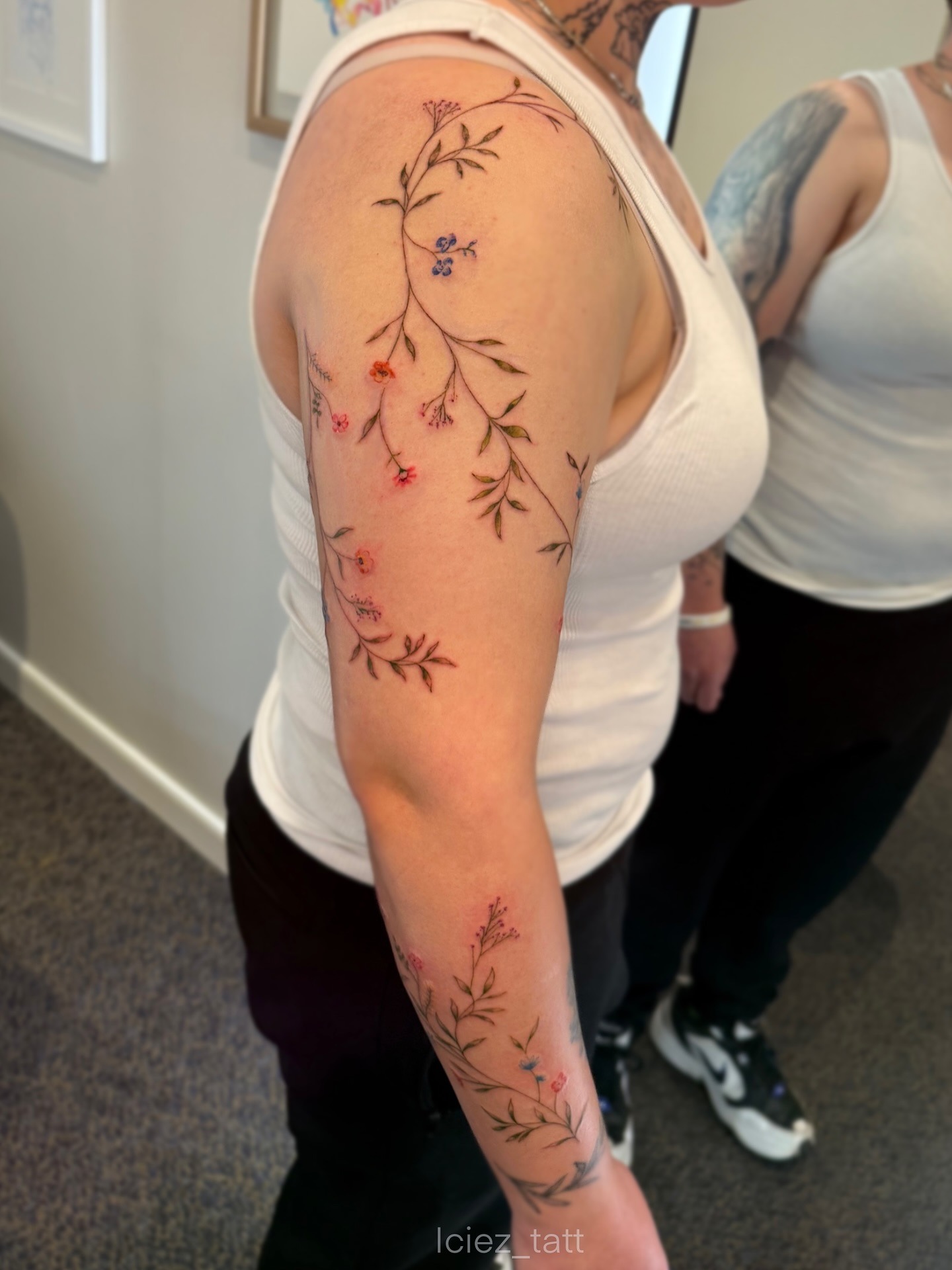 Colorful Floral Vine Tattoo on Arm Tattoo Design