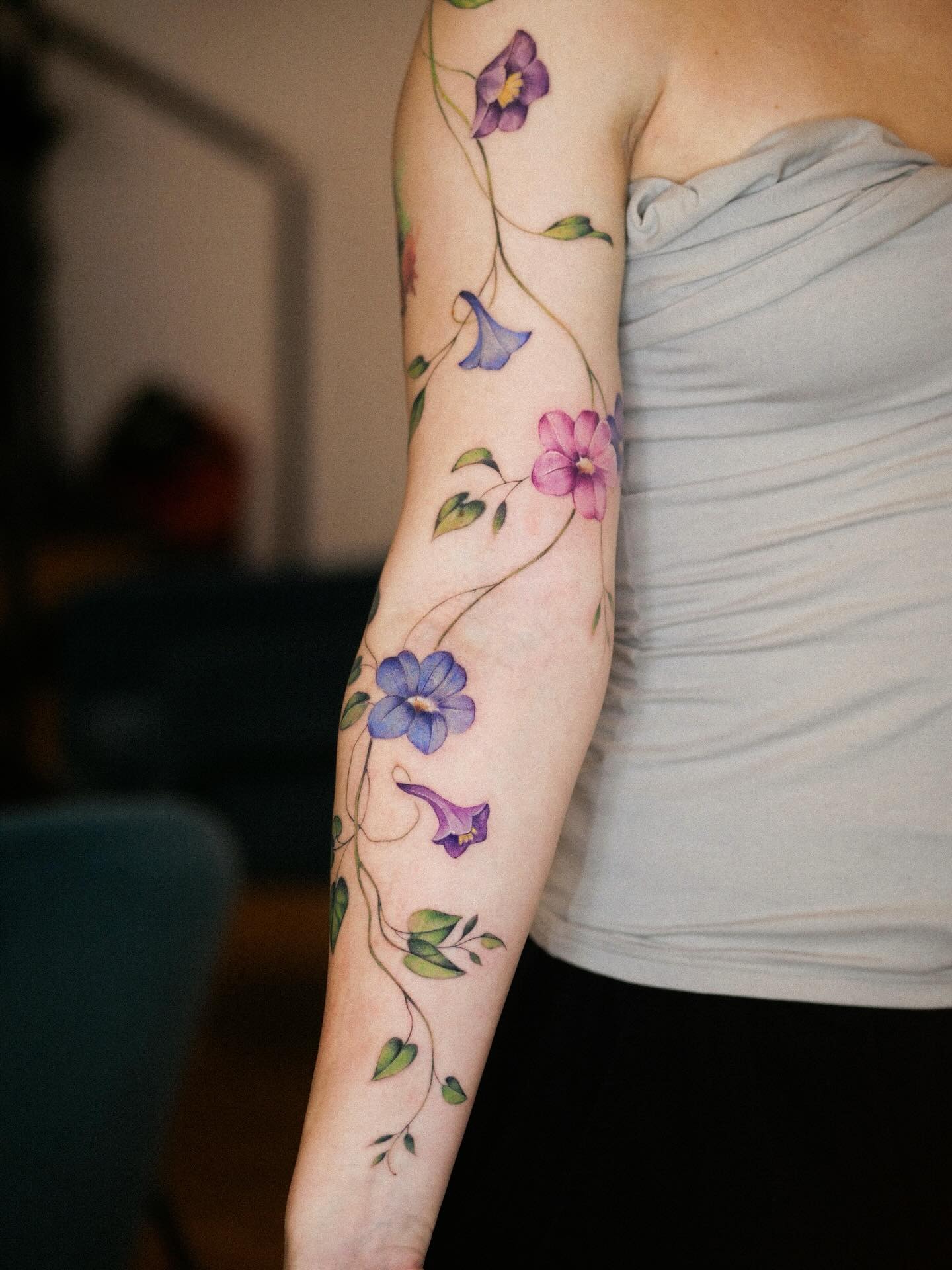 Colorful Flower Vine Tattoo on the Arm Tattoo Design