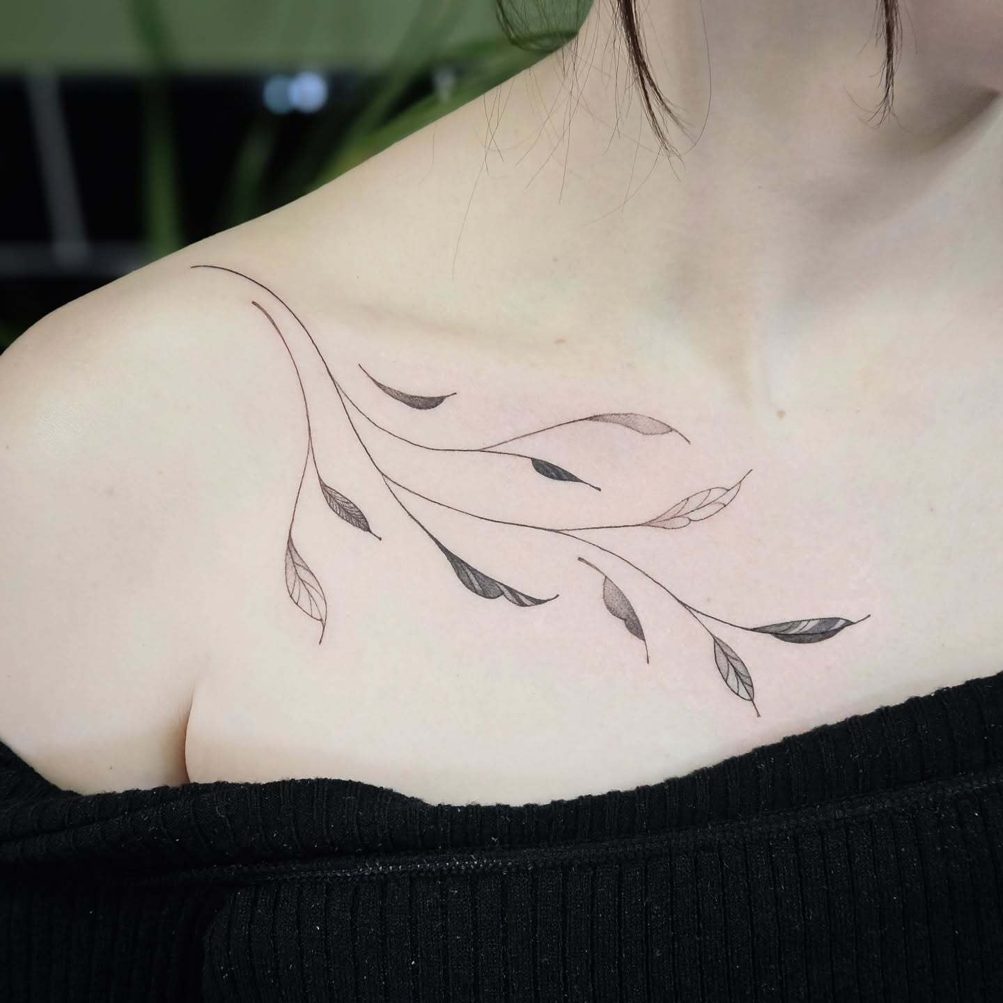 Delicate Vine Tattoo Across the Collarbone Tattoo Design