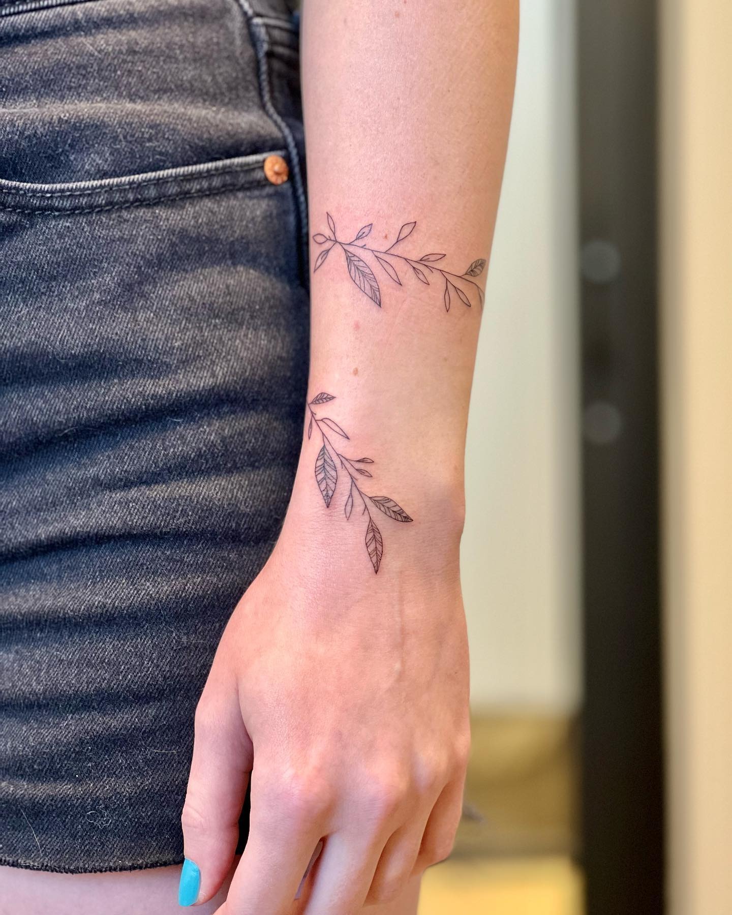 Delicate Vine Wrap Tattoo on Wrist Tattoo Design