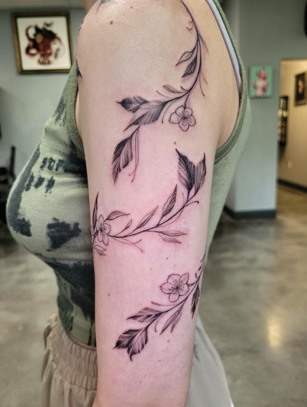 Floral Vine Tattoo on the Upper Arm Tattoo Design