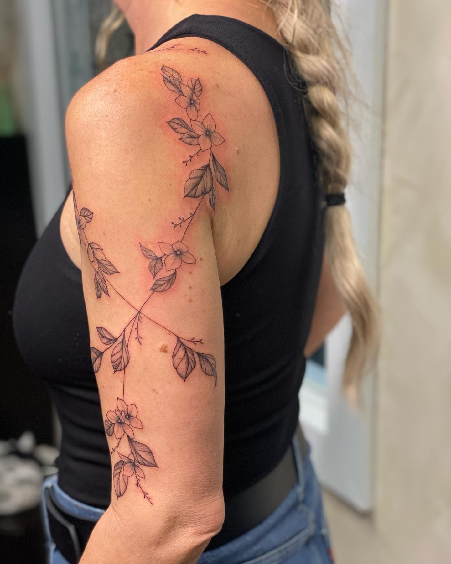 Floral Vine Wrap Tattoo on Upper Arm Tattoo Design