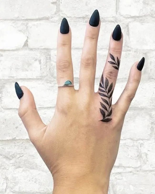 Leafy Vine Tattoo on Finger and Hand Tattoo Design