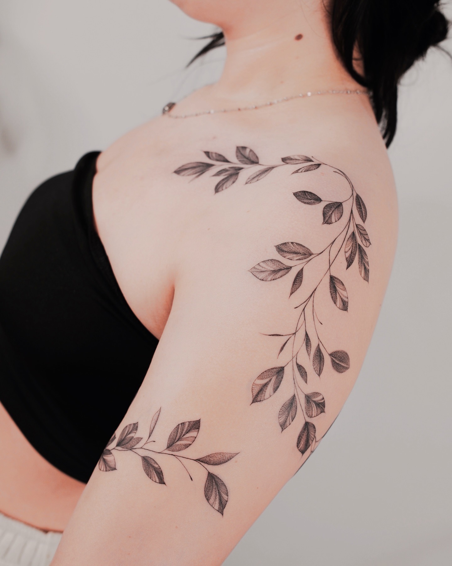 Leafy Vine Tattoo on Shoulder and Arm Tattoo Design