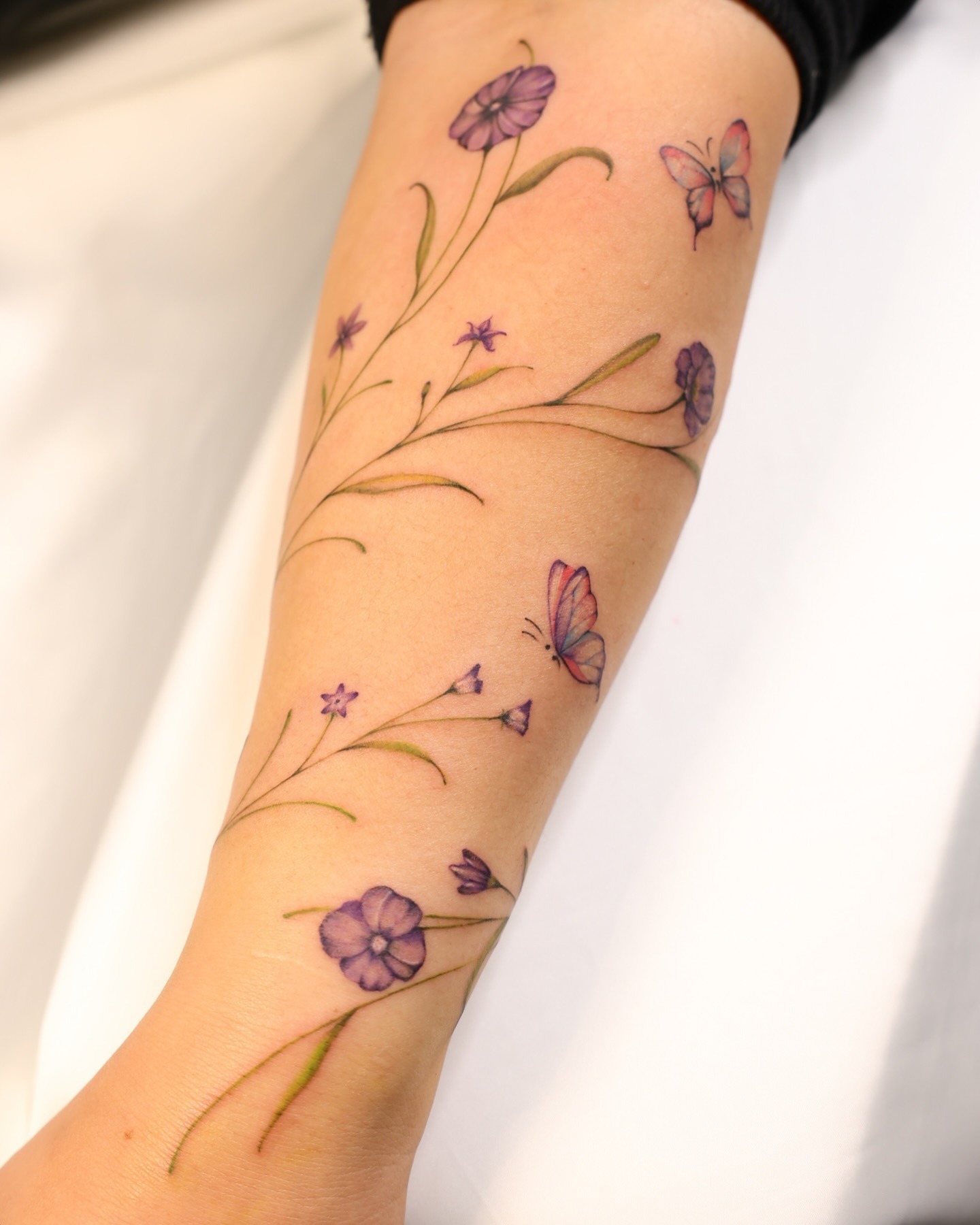 Purple Flower Vine Tattoo with Butterflies Tattoo Design