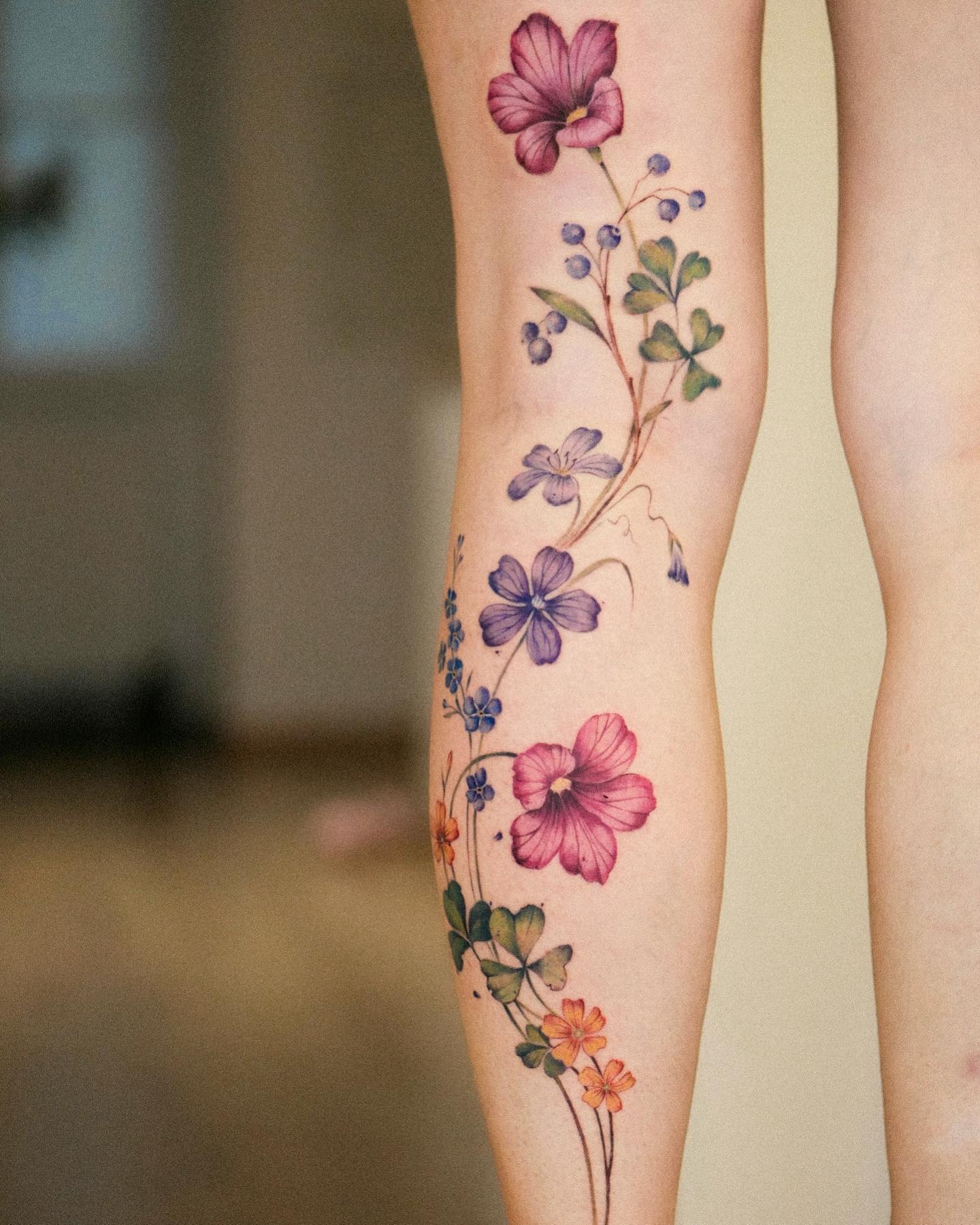 Wildflower Vine Tattoo with Mallows, Forget-Me-Nots, and Blueberries Tattoo Design