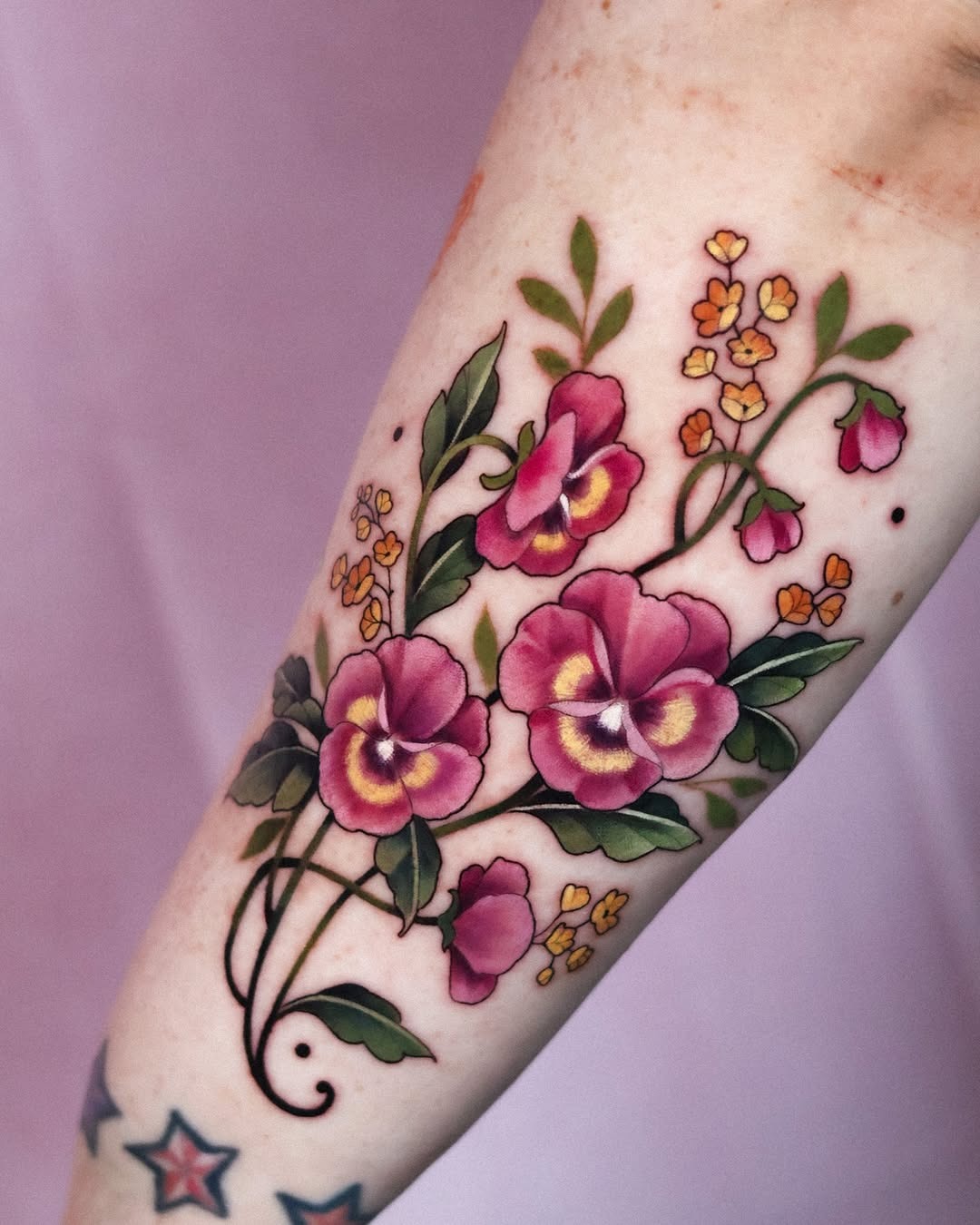 Elegant floral violet tattoo design on forearm Tattoo Design