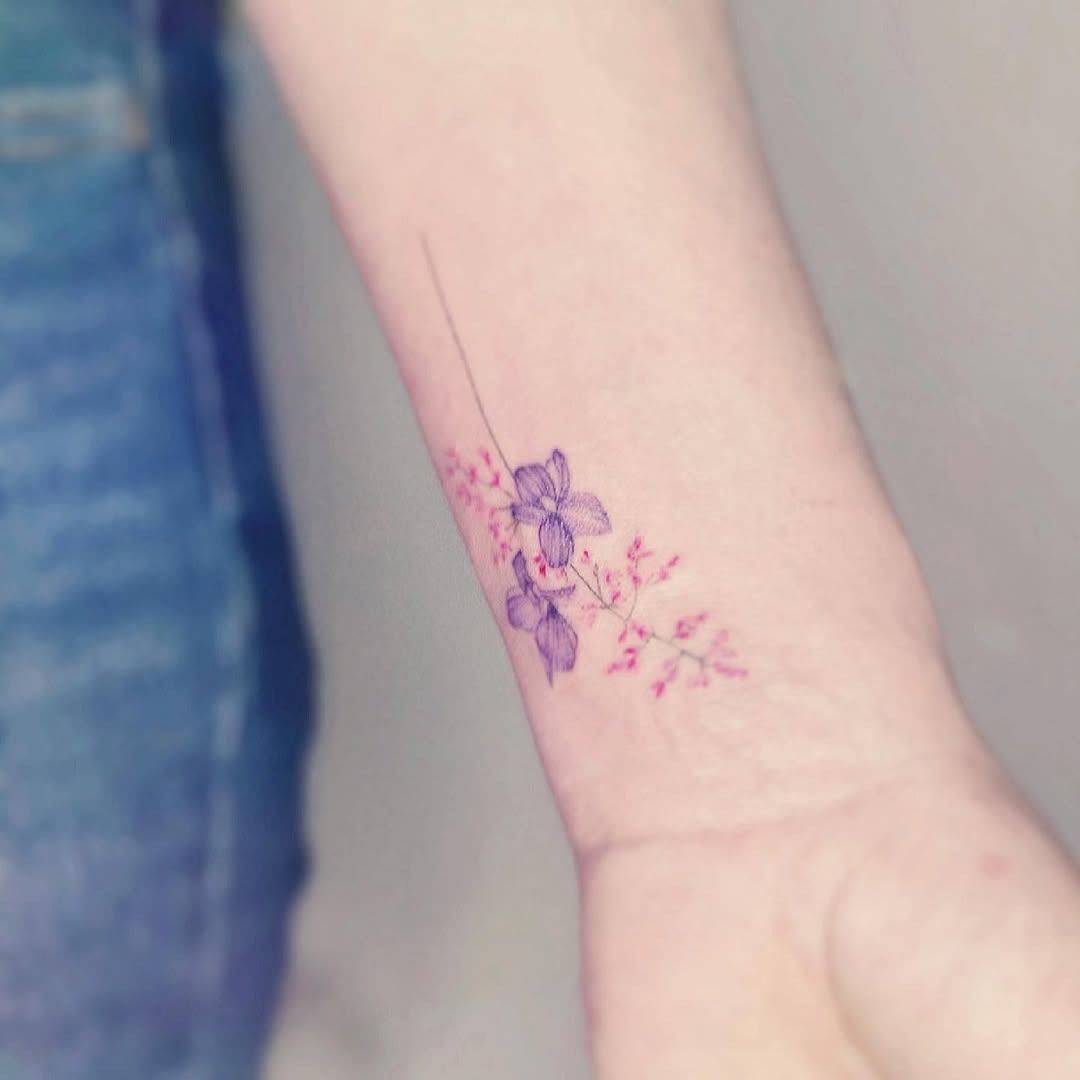 Elegant violet floral tattoo perfect for minimalists Tattoo Design