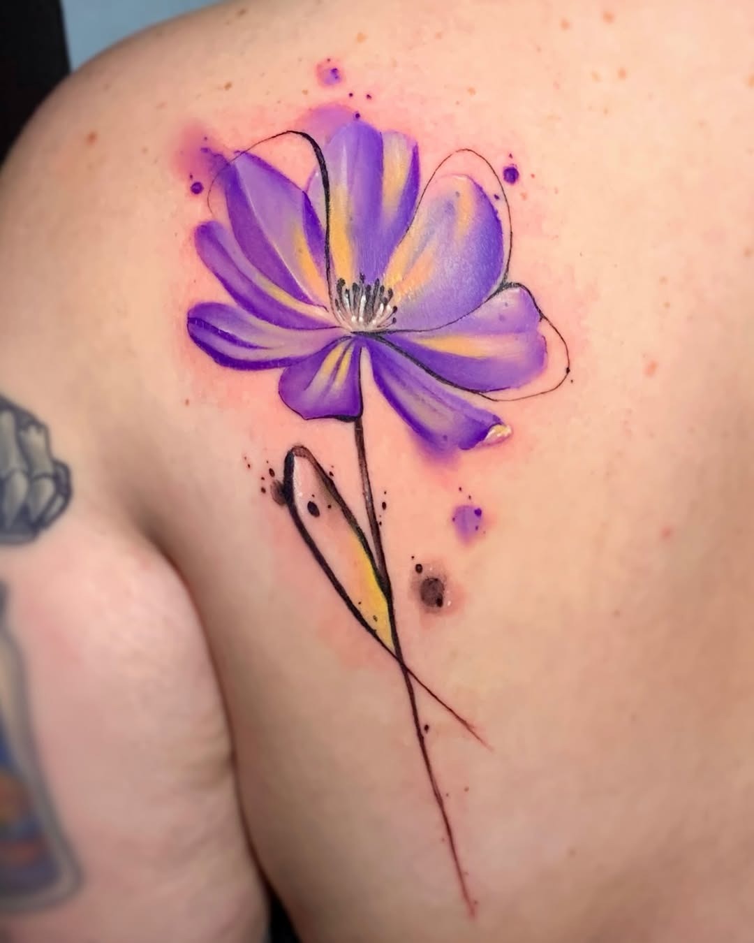 Elegant violet flower tattoo on the shoulder Tattoo Design