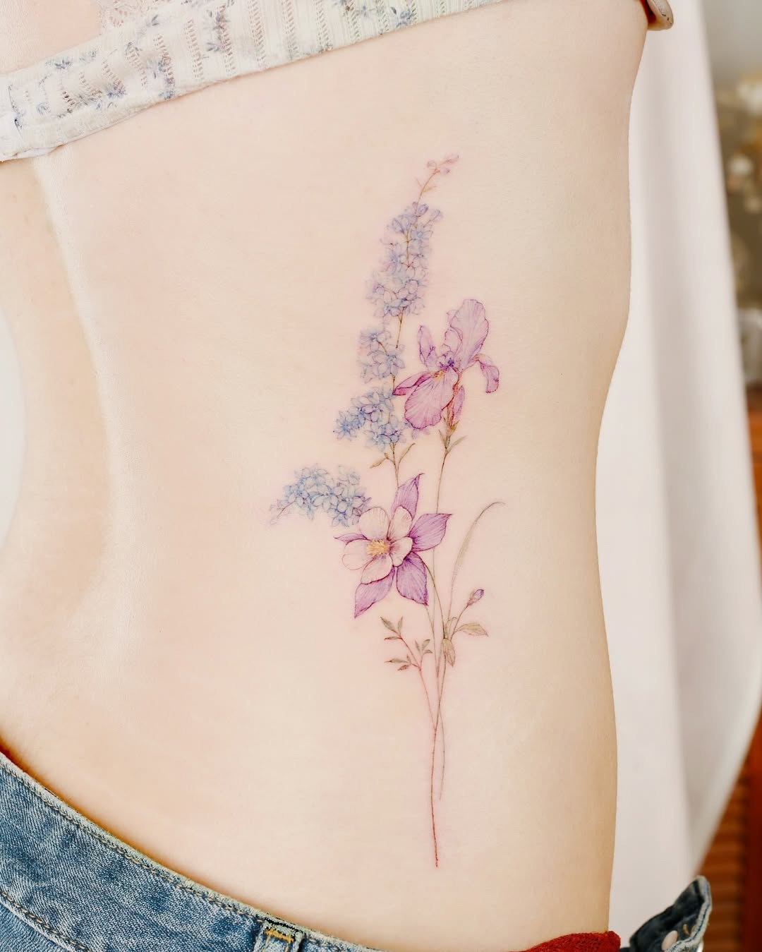 Elegant violets depicted in soft watercolor style Tattoo Design