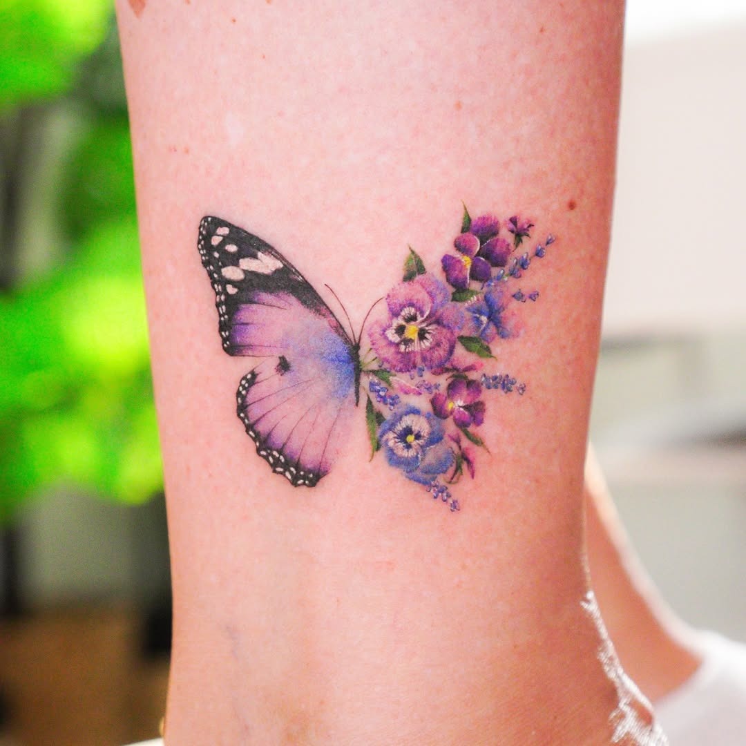 Stunning violet butterfly and floral tattoo design Tattoo Design