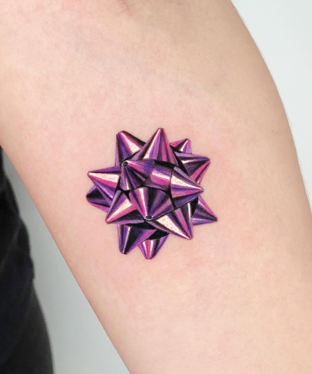 Stunning violet gift bow tattoo design Tattoo Design