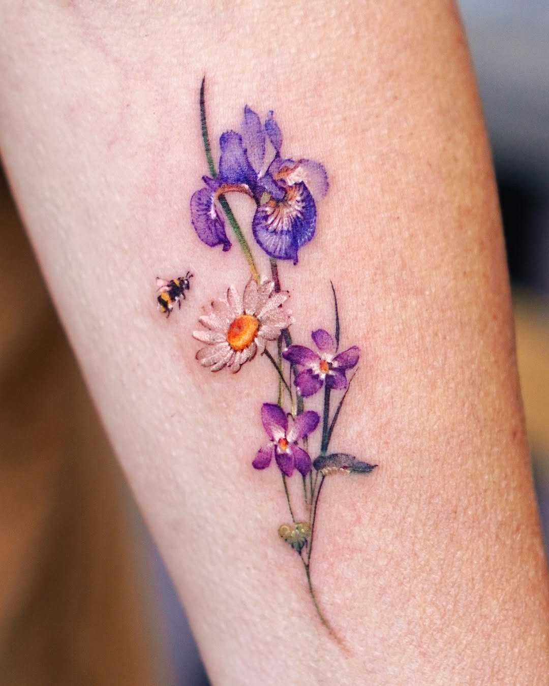 Vibrant violet floral tattoo with bee Tattoo Design